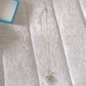 Elegant Silver CZ And Pearl Pendant Necklace